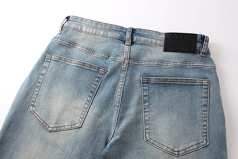 LOSTSHDWS Light Blue Daisy Applique Flared Jeans